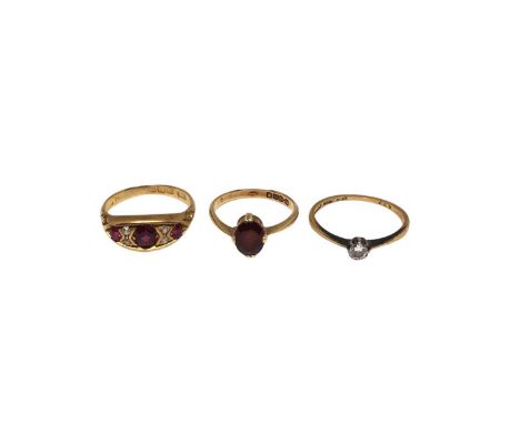 18ct gold diamond single stone ring, size N½, 18ct gold garnet single stone ring, size L and 18ct gold ruby and diamond ring,