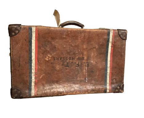 Vintage brown leather suitcase 'E.F.T. XIII HUSSARS' with remains of luggage labels New Zealand Shipping Co.
