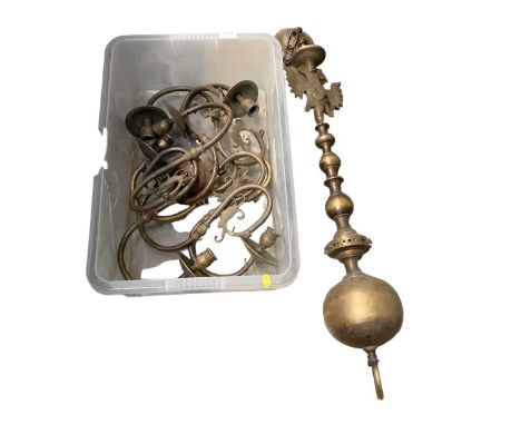 Large and heavy brass chandelier with devil's head motif