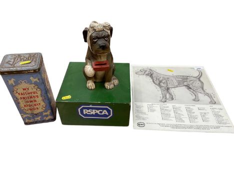 RSPCA collecting box surmounted with a poorly dog, 31cm high, with a vet's dog chart and vintage tin