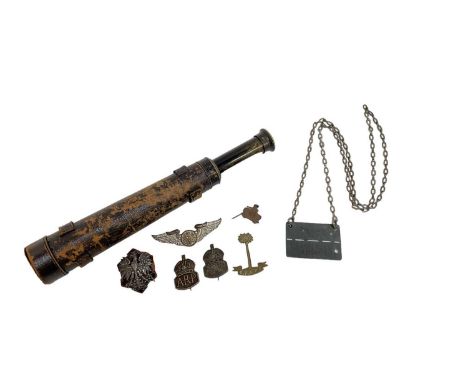 Second World War Prisoner of War Staglag IV B dog tag, together with a Second World War enamel (possibly Polish) badge, two s