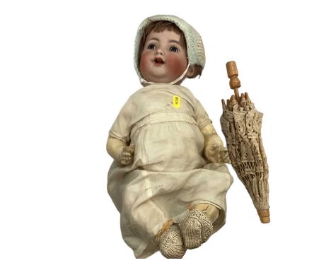 Doll bisque head marked Simon &amp; Halbig 126 K*R, brown flirty eyes, rosy cheeks, painted lips, lashes and brows, two teeth