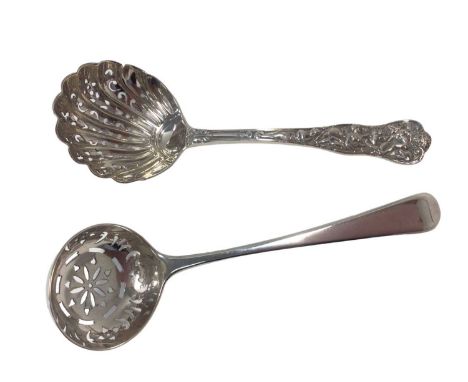 Rare Bacchanalian pattern silver sifter ladle with fluted bowl, the handle showing Bacchus riding a lion whilst Diana looks o