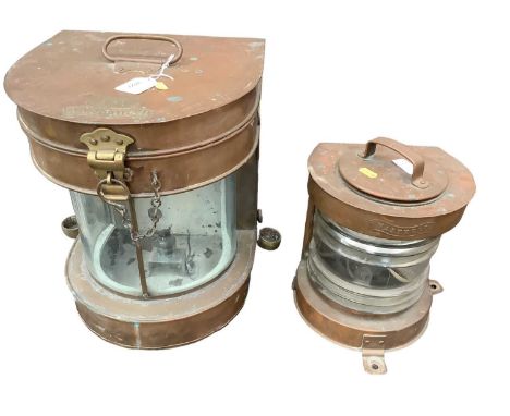 Large copper mast head lantern, 36cm high together with a smaller lantern and a ship's wheel, 86cm total diameter (3)