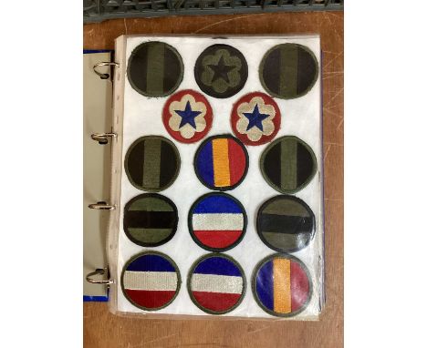 Four albums of American US Army military cloth badges to include patches and rank insignia (4 albums)