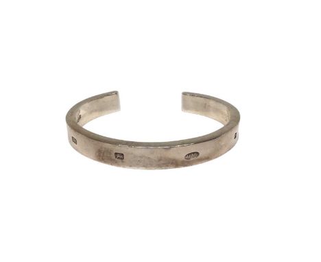 Silver torque bangle with large hallmark decoration (Birmingham 2003)