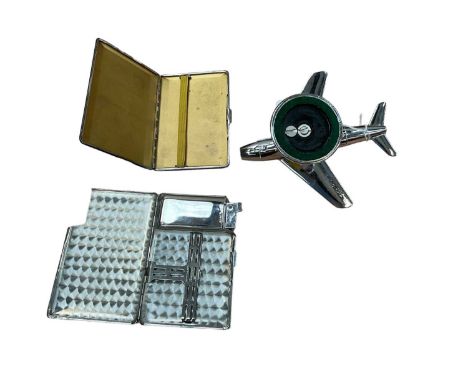 Art Deco Dunhill chromium plated novelty table lighter in the form of an aeroplane, together with two cigarette cases