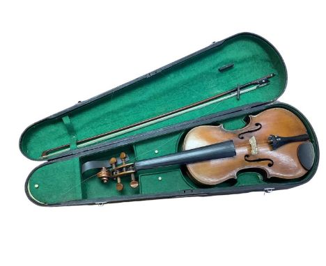 Late 19th century violin with bow, the violin bearing Stradivarius label, in wooden case