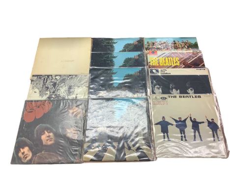 Vintage case containing Beatles LPs including White Album- No. 0012159, multiple copies of early albums and spare sleeves. (S