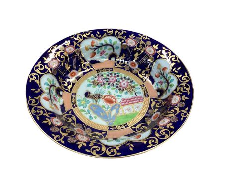 A Copeland Spode circular bowl, decorated in the Imari palette, with tropical bird and foliage decoration, printed and painte