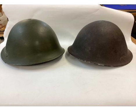 1950's British military MK III steel helmet with camouflage finish, with liner and chin strap, together with another similar 