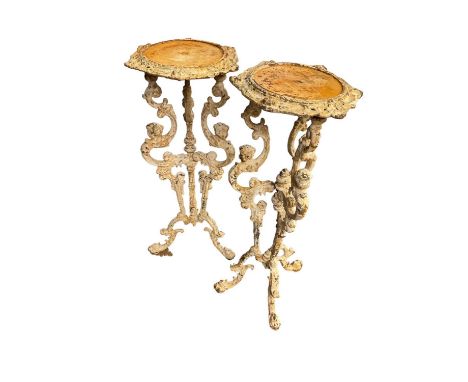 Pair of antique cast iron stands, on tripod supports, 80cm highFlaking to paint, supports are slightly loose but secure and n