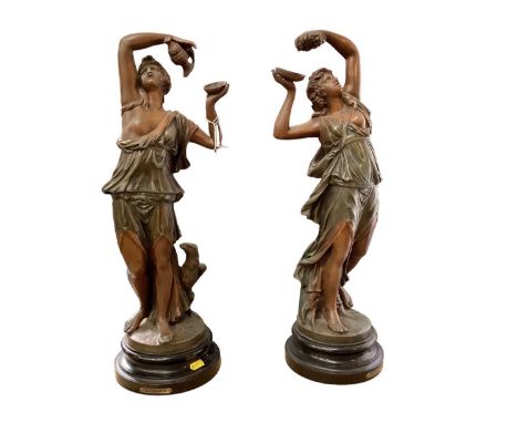 A large pair of Art Nouveau style spelter figures, entitled 'Bacchante', 53cm high