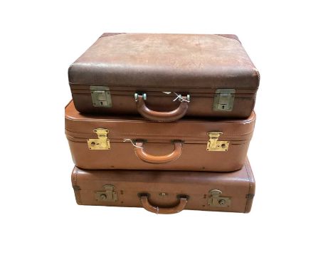 Three vintage suitcases to include two brown leather cases (3)