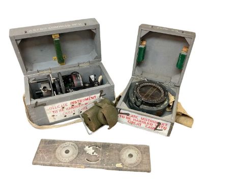 Second World War aircraft compass with brass Air Ministry plaque, together with a Second World War Astro Compass MKII and a b
