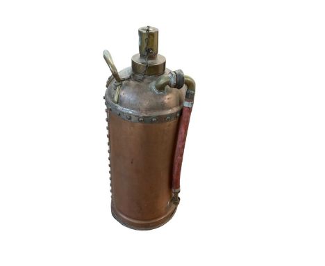 Vintage copper fire extinguisher stamped 30450 near base, approximately 50cm in height.