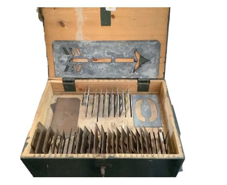 Vintage set of stencil letters in wooden case