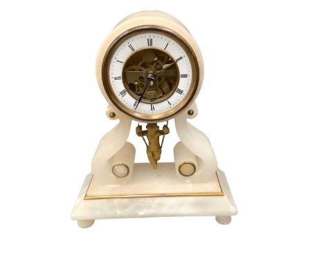 Continental onyx clock with a cherub on a swing, enamel dial, 23.5cm high