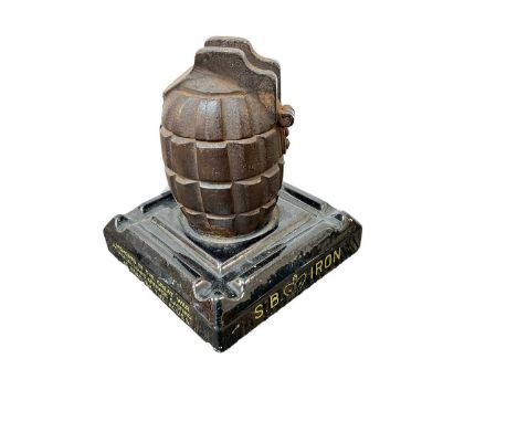 Interesting First World War grenade inkwell on square base marked 'S.B. Iron &amp; Steel, reg. no. 651542, 1915, memento of t