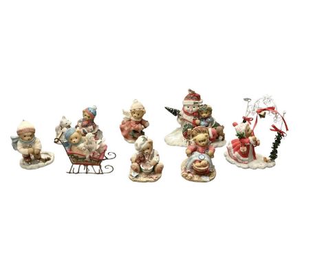 Two boxes of Cherish bears, two boxes of Christmas Village ornaments and one box of resin figures (5) plus small quantity of 