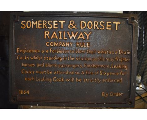 A cast iron plaque inscribed 'Somerset & Dorset Railway Co. rule, engine men are forbidden to blow their whistles or Drain Co