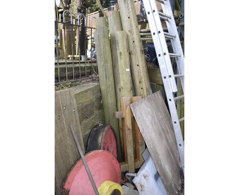 Nine telegraph poles/ gate posts and sundry timber.