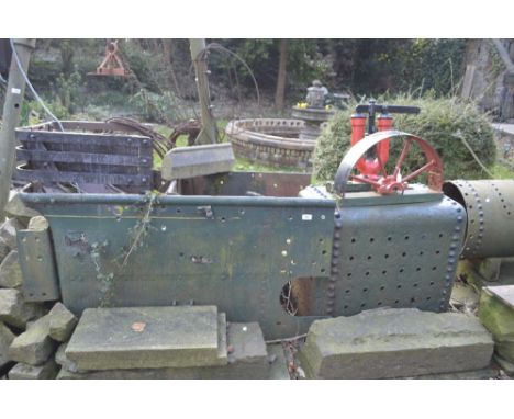 Part of a body and part of a water tank from a steam roller (2).