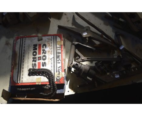 Miscellaneous items to include a pick axe head, drill harbours, chains etc. 