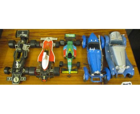 Two Burrago vintage cars, Burrago Formula One car and two Corgi Formula One cars