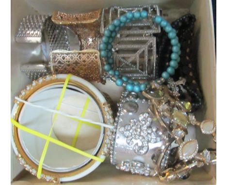 Three decorative bangle bracelets, group of decorative bangle bracelets, silver coloured leather bracelet and three other dec