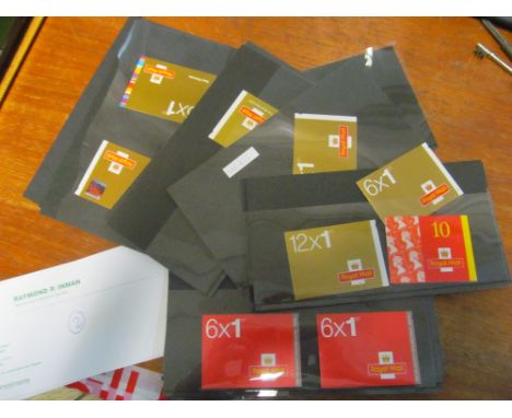Forty-three books of six First Class stamps, a ten, twelve and eight