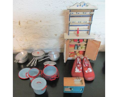 A pair of childs red leather shoes, an Italian dolls house dresser filled with miniature kitchenalia and some enamel and meta