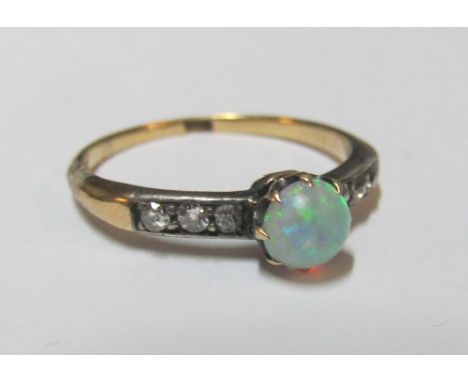 An 18ct opal and diamond ring, size O/P 2.2g