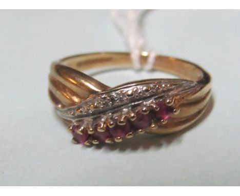 A 9ct gold ruby and marcasite ring