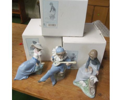 Three Nao figures (boxed)