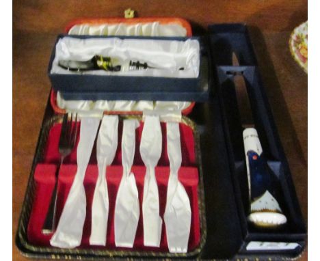 A bottle stopper, Royal Worcester 200 letter opener and six plated cake knives