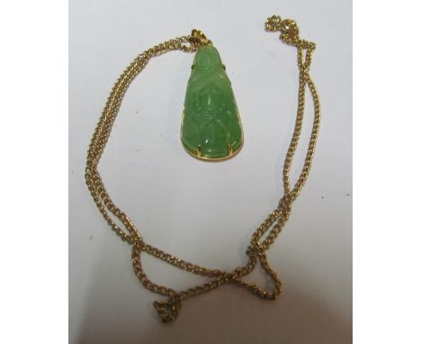 A jade pendant mount marked 18 on chain