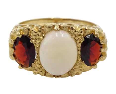 9ct gold three stone garnet and opal ring Condition Report & Further Details Tested 9ct approx 6.7gm, size P-QClick here for 