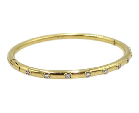 18ct gold hinged bangle set with nine diamonds Condition Report & Further Details Approx 15gm, tested to 18ct, inner circumfe