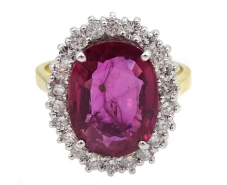 18ct gold ruby and diamond cluster ring hallmarked, ruby approx 4.60 carat, diamond total weight approx 0.70 carat Condition 