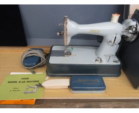 Vintage Jones electric sewing machine in original case with manual&nbsp;