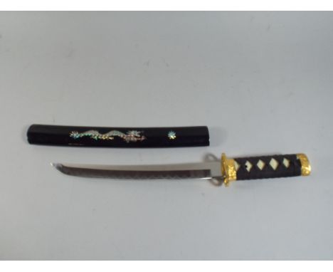 A Reproduction Miniature Katana Sword with Dragon Decorated Scabbard.