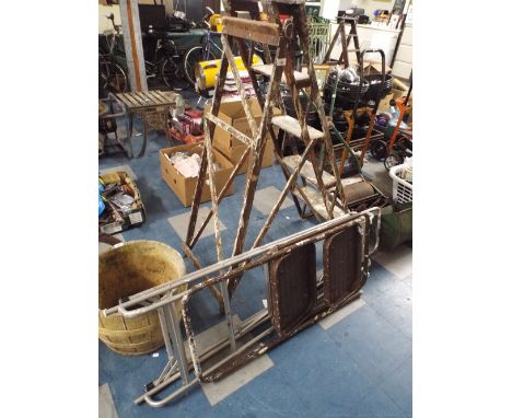 A Vintage Wooden Step Ladder and Two Metal Examples. 