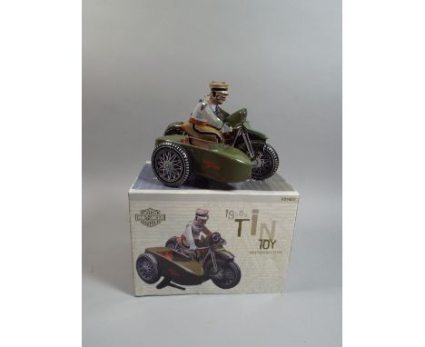 A Boxed Reproduction Tin Plate Clockwork Harley Davidson Motorcycle.
