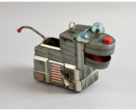 A vintage KO Japan tin plate clockwork robot dog..  