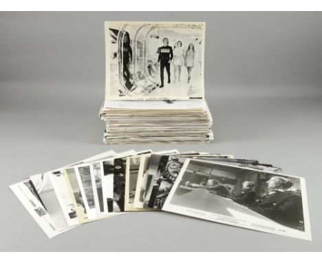 400+ vintage black & white film stills, mainly 10 x 8 inches including Buck Rogers, Judgment at Nuremberg, Red Sonja, Roger M