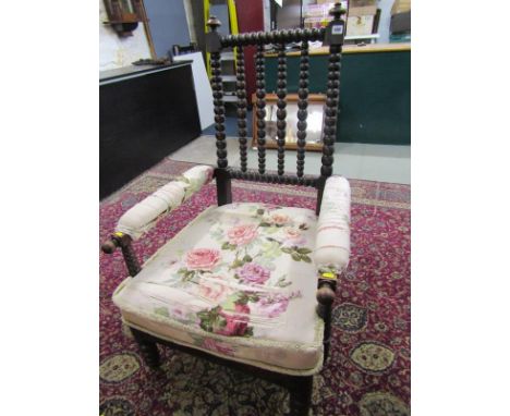 BOBBIN FRAMED CHAIR, late 19th Century stained beech bobbin framed chair with floral upholstered seat and arms 640- slight lo