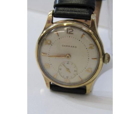 GENT'S GOLD CASED WATCH, Gent's Garrard gold cased wrist watch with secondary dial, inscription to rear, on leather strap, 42