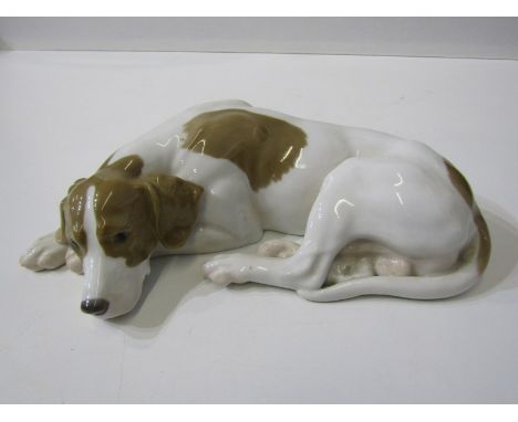 BING & GRONDAHL, porcelain figure of sleeping hound, 24cm length Lot 377: In good condition throughout with no visible damage