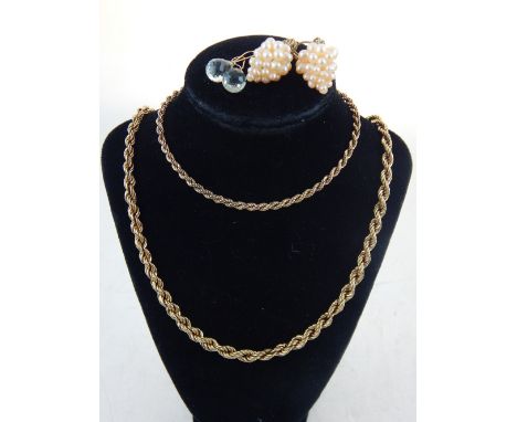 A 9ct yellow gold rope twist necklace, a yellow metal rope twist necklace, a yellow metal aqua drop earrings, and a pair of s